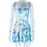 Robe de vacances courte à volants et bretelles spaghetti imprimées